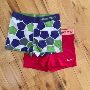 2 pairs of medium Nike bike shorts